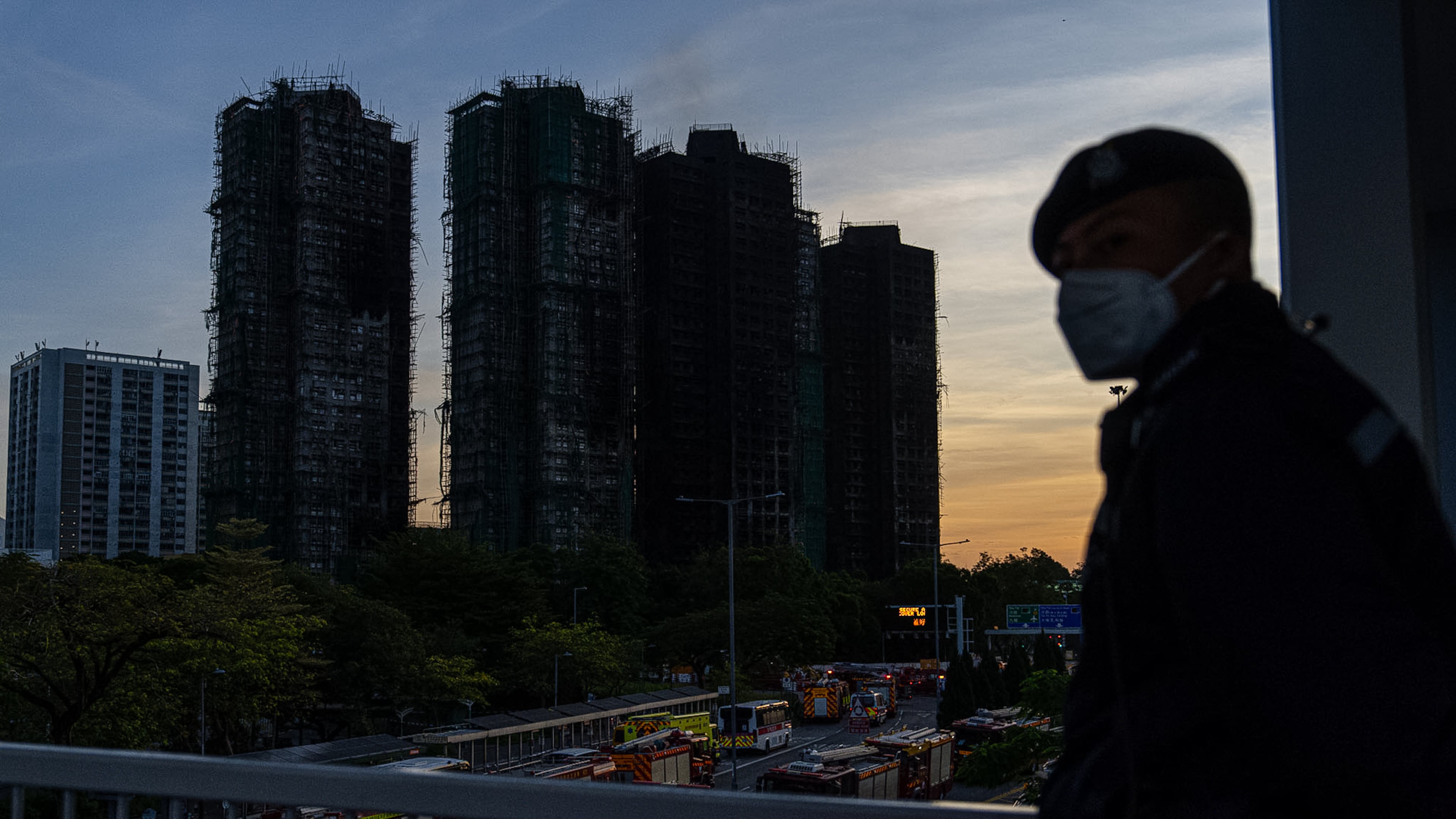 Burned buildings are seen at the scene of the fire at Wang Fuk Court, a residential estate in the Tai Po district of Hong Kong's New Territories, Friday, Nov. 28 2025. (AP Photo/Chan Long Hei)