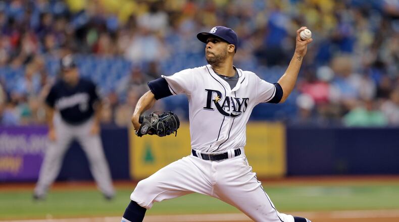 Tampa Bay Rays starting pitcher David Price delivers to Milwaukee Brewers' Ryan Braun during the seventh inning of an interleague baseball game Wednesday, July 30, 2014, in St. Petersburg, Fla. (AP Photo/Chris O'Meara) Trying to picture David Price in a Braves' uniform? Don't waste your time. (AP)