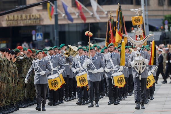 German soldiers march at the formal inauguration of a German brigade for NATO's eastern flank in the center of Vilnius, Lithuania, Thursday, May 22, 2025. (AP Photo/Mindaugas Kulbis)