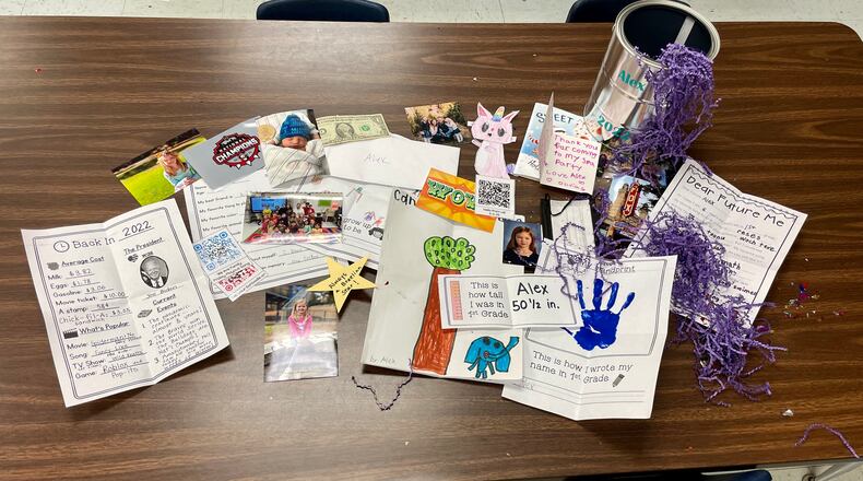 First graders at Braelinn Elementary assembled memorabilia collections for their paint can "time capsules."