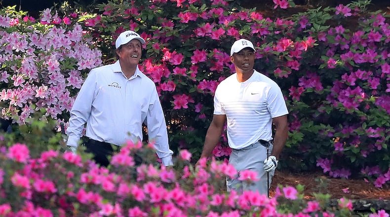 Whatever the stakes were when Phil Mickelson and Tiger Woods played a practice round together this year at the Masters, they weren't made public. (Curtis Compton/Atlanta Journal-Constitution/TNS)