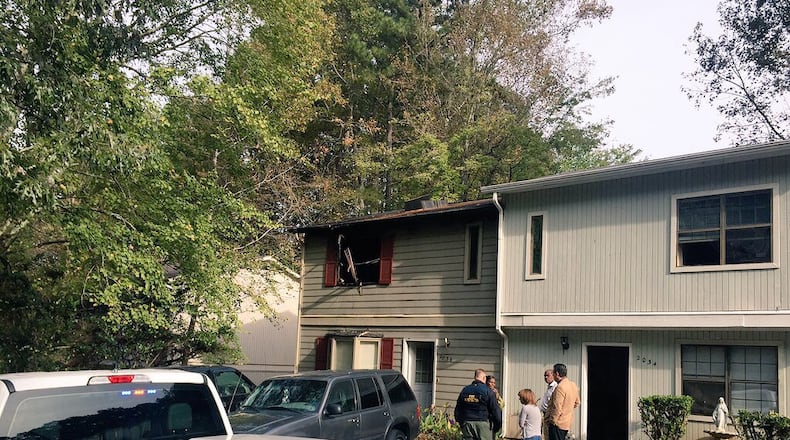 A man faces felony murder and arson charges in connection with a deadly condo fire in Austell, authorities said.