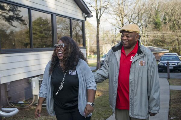 EGM Services Inc. CEO Kelsi Queen-Robinson (left) and her father, Arthur Queen, chairman of the board of EGM Services Inc., share a laugh at their office in Decatur Jan. 24, 2020. Queen-Robinson left her job as an educator and got an MBA to help run her father’s business. ALYSSA POINTER/ALYSSA.POINTER@AJC.COM