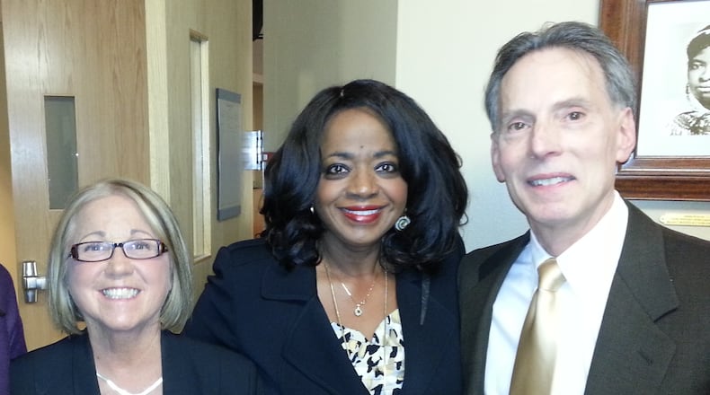 Atlanta's Dr. Melody McCloud (center) is joined by Boston University School of Medicine's Dr. Jean Ramsey assistant dean of alumni affairs, and Dr. Doug Hughes associate dean of academic affairs, at the Dr. Rebecca Lee Crumpler exhibit unveiling on Feb. 19, 2016.
