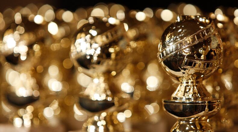 FILE - In this Jan.. 6, 2009, file photo, Golden Globe statuettes are seen during a news conference at the Beverly Hilton Hotel in Beverly Hills, Calif. (AP Photo/Matt Sayles, File)