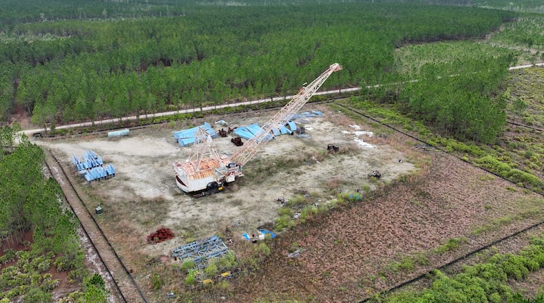 Drone photograph shows equipment stationed on the Twin Pines Minerals mine site on Monday, Mar. 18, 2024, in Charlton County near the Okefenokee Swamp. (Hyosub Shin / Hyosub.Shin@ajc.com)