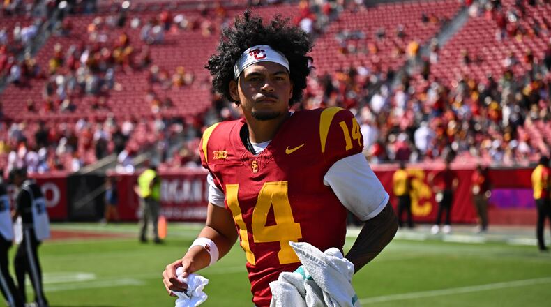 Southern California quarterback Jayden Maiava runs on the field after his team defeated San Jose State in an NCAA college football game, Saturday, Aug. 29, 2026, in Los Angeles. (AP Photo/William Liang)