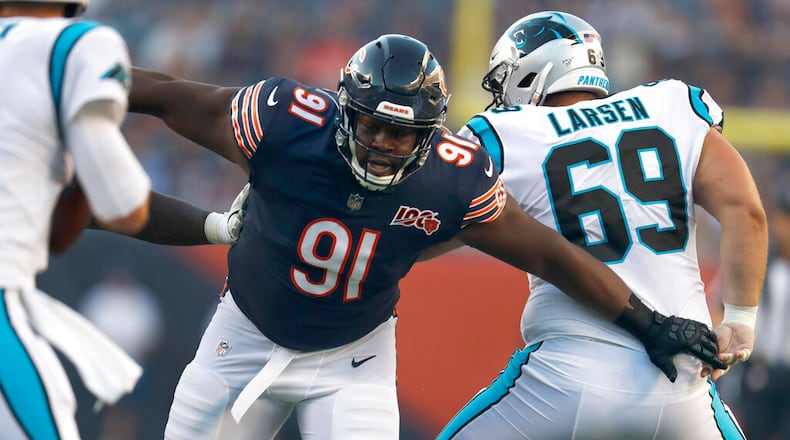 Chicago Bears nose tackle Eddie Goldman breaks through the Carolina Panthers offensive line during the first half Thursday, Aug. 8, 2019, in Chicago. (AP Photo/Amr Alfiky, File)