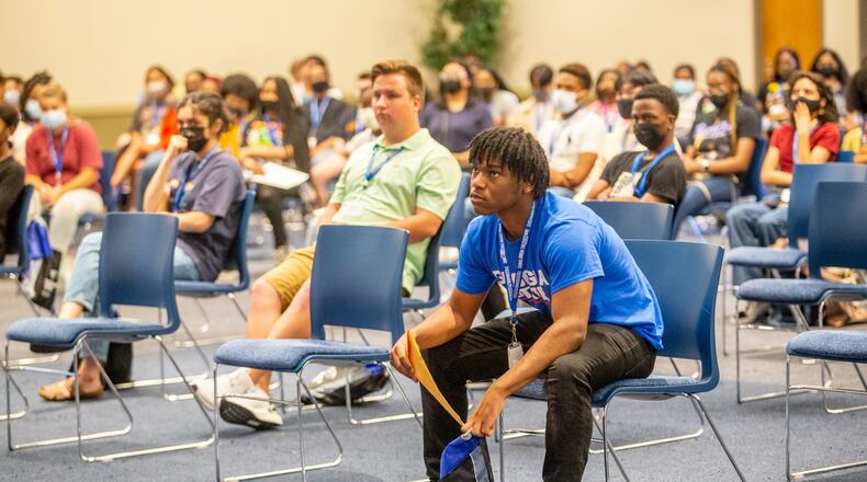 Georgia State University holds orientation where Ajani Gervais gets ready to take a tour of campus with more than 150 other incoming students Wednesday, June 23, 2021. Parents and students are presented with school standards and matched with student orientation leaders for group tours of the campus. Students move to campus in August. (Jenni Girtman for The Atlanta Journal-Constitution)