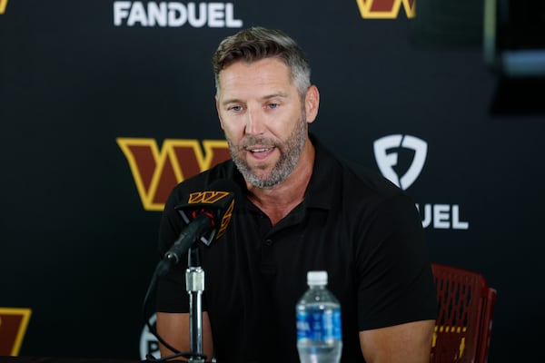 Washington Commanders general manager Adam Peters speaks during a news conference at the NFL football team's training camp in Ashburn, Va., Tuesday, July 22, 2025. (AP Photo/Luis M. Alvarez)
