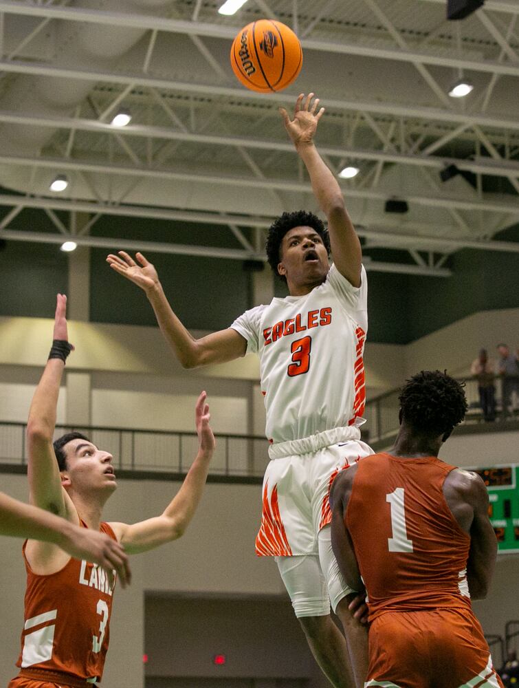 Photos: High school basketball state tourney continues