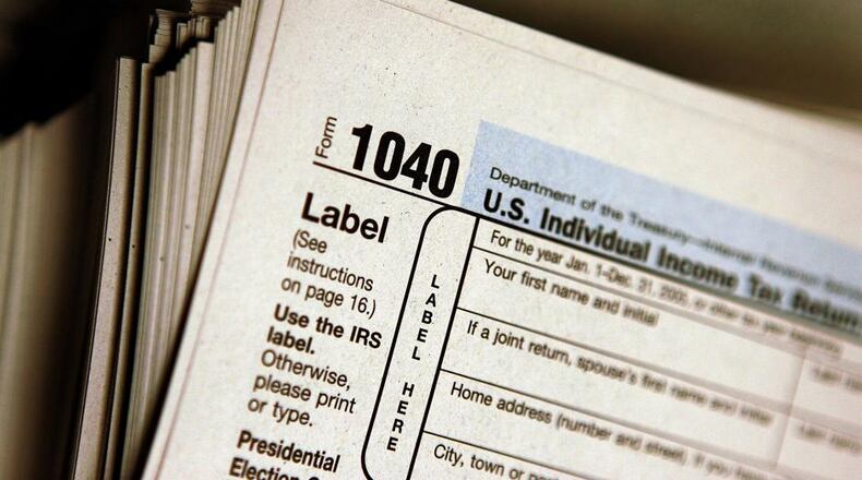 A Cobb County businessman pleaded guilty to attempting to bribe an IRS agent to reduce his tax burden.