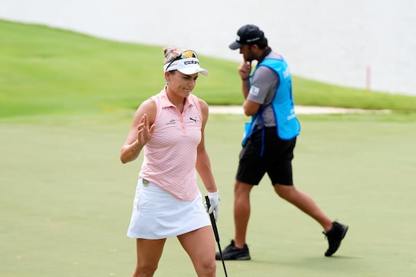 Lexi Thompson reacts on the fifth hole during the second round of the Chevron Championship LPGA golf tournament Friday, April 25, 2025, in The Woodlands, Texas. (AP Photo/Ashley Landis)