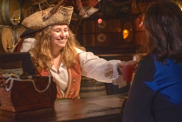 A visitor is served a drink in the tavern at the Savannah Pirates and Treasure Museum. (Courtesy of Travis Spagenhurg)