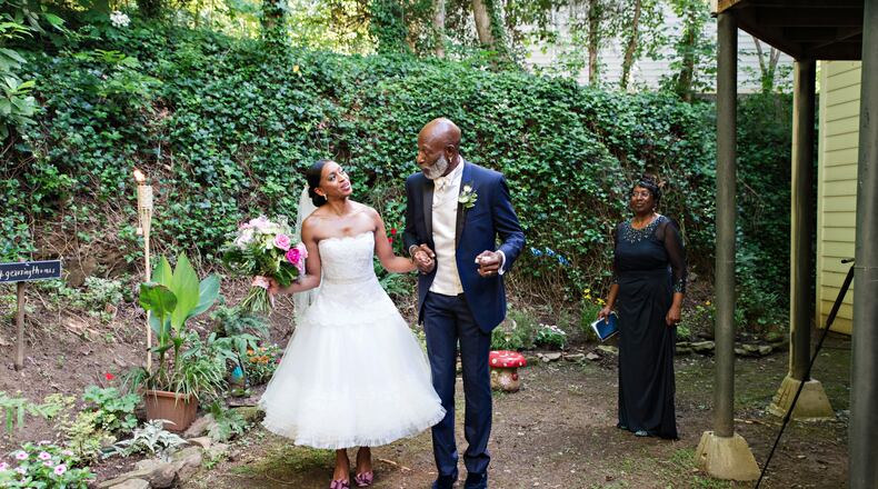 LeJeanne and Daniel Thomas recently tied the knot despite challenges from the pandemic. LeJeanne Thomas wed in a dress borrowed from Spanx founder Sara Blakely. CREDIT:  Michelle Davina Photography