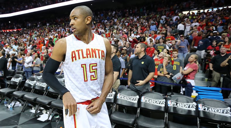 Hawks center Al Horford walks off the court for possibly the last time as an Atlanta player following Sunday's loss to the Cleveland Cavaliers. Horford is an unrestricted free agent. (Curtis Compton / ccompton@ajc.com)