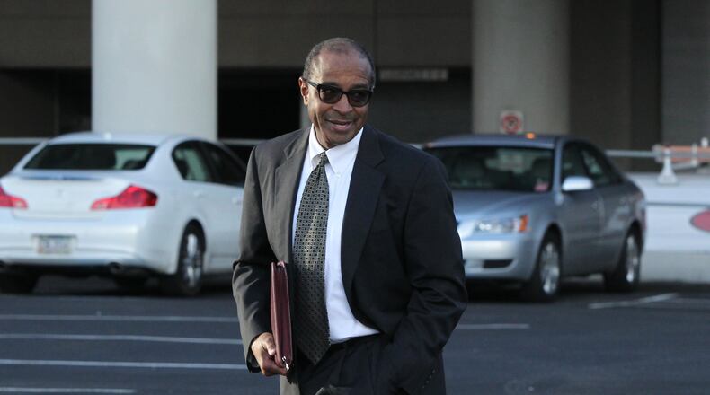 Elvin “E.R.” Mitchell Jr. returns to his car after pleading guilty in January in the Atlanta City Hall bribery investigation. (HENRY TAYLOR / HENRY.TAYLOR@AJC.COM)