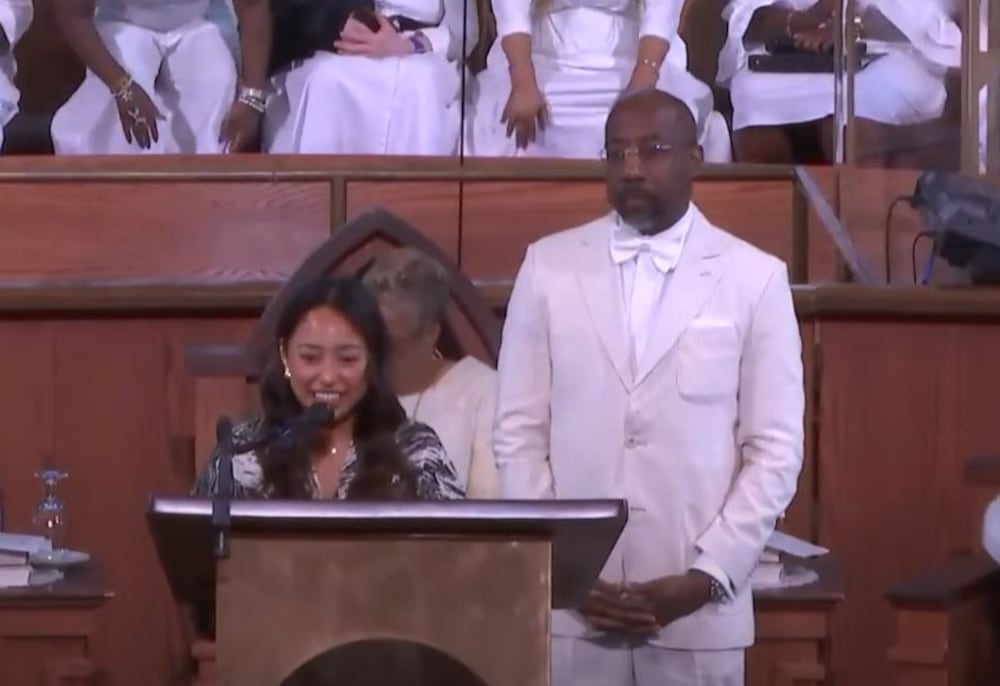 Ximena Arias-Cristobal (left) spoke at Ebenezer Baptist Church in Atlanta on Sunday. Democratic U.S. Sen. Raphael Warnock is the church's senior pastor.