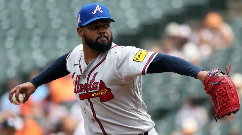 Atlanta Braves pitcher Reynaldo Lopez throws during the first inning of a baseball game against the Baltimore Orioles, Sunday, July 26, 2026, in Baltimore. (AP Photo/Daniel Kucin Jr.)