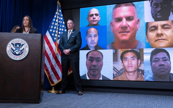 Deputy director of U.S. Immigration and Customs Enforcement Madison Sheahan, flanked by Acting director of U.S. Immigration and Customs Enforcement (ICE) Todd Lyons, speaks during a news conference at ICE Headquarters, in Washington, Wednesday, May 21, 2025. (AP Photo/Jose Luis Magana)