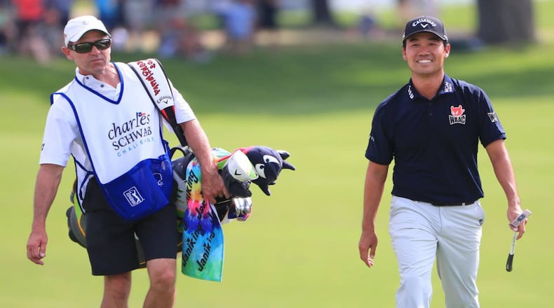 Kevin Na, right, gifted his caddie, Kenny Harms, a 1973 Dodge Challenger after winning Sunday's PGA Tour event.