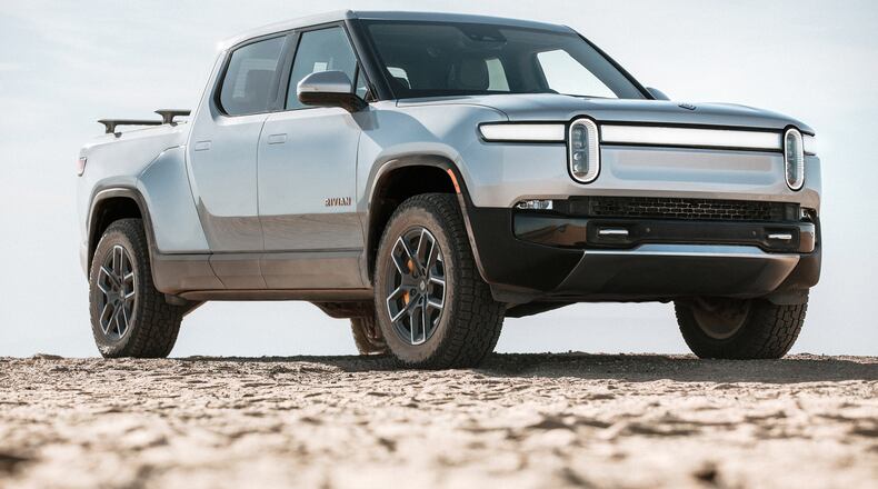 Rivian Automotive's all-electric pickup truck, the R1T. Georgia state and local officials promised Rivian nearly $1.5 billion in tax breaks and other incentives to build a factory east of Atlanta, the most lucrative package of inducements the state has ever offered. (Rivian Automotive Inc./TNS)