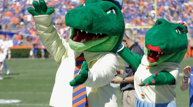 The University of Florida is ending its “gator bait” cheer at football games and other sports events because of its racial connotations.