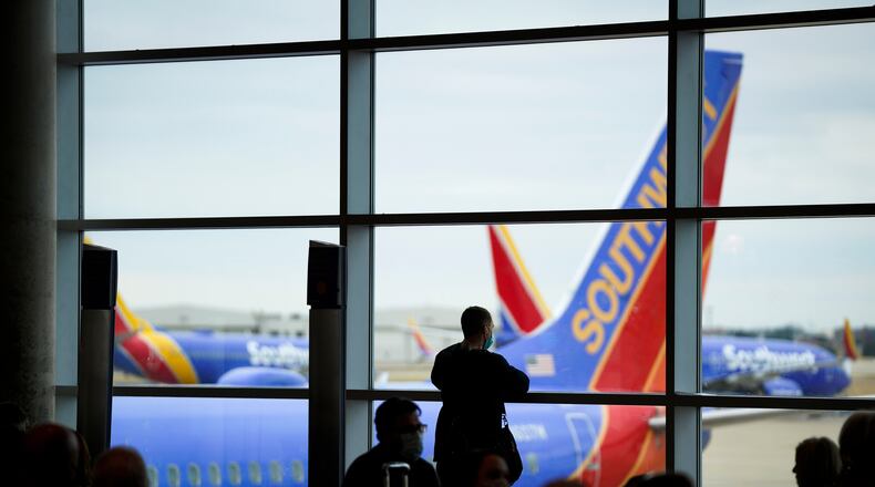 Passengers wait to board a Southwest Airlines flight at Dallas Love Field on Thursday, Jan. 7, 2021, in Dallas. (Smiley N. Pool/The Dallas Morning News/TNS)