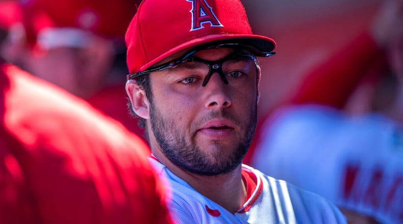 Los Angeles Angels shortstop David Fletcher looks over in the dugout before a baseball game against the Seattle Mariners in Anaheim, Calif., Wednesday, Aug. 17, 2022. (AP Photo/Alex Gallardo)