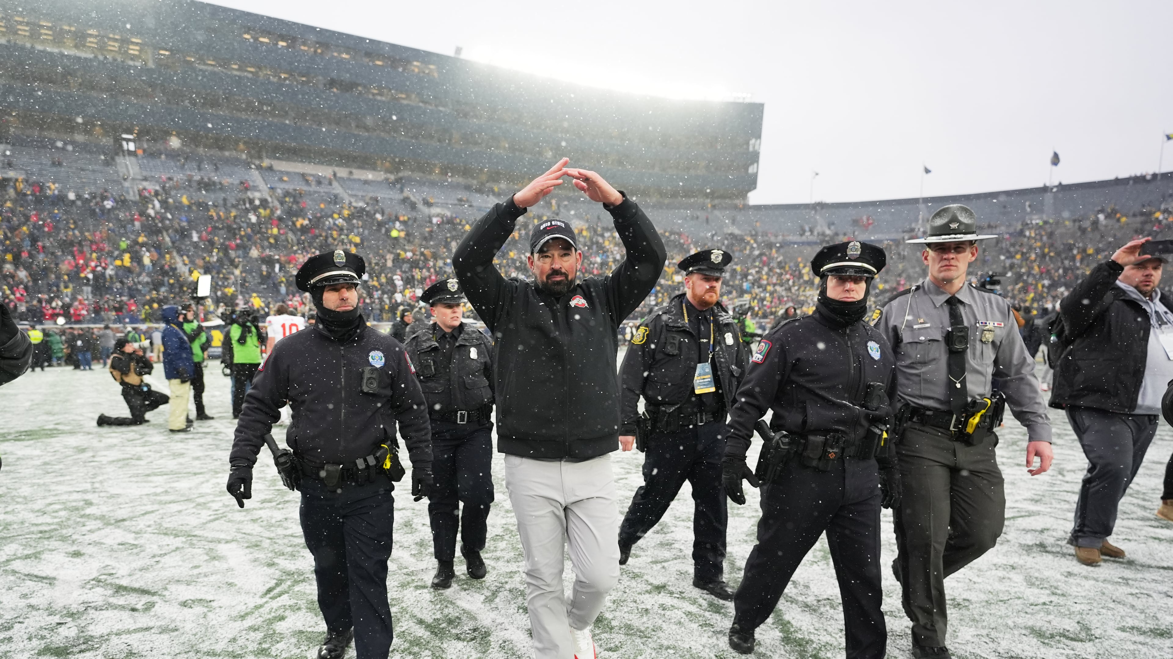 Ohio State Buckeyes head coach Ryan Day celebrates after the team's win against Michigan in an NCAA college football game, Saturday, Nov. 29, 2025, in Ann Arbor, Mich. (AP Photo/Ryan Sun)