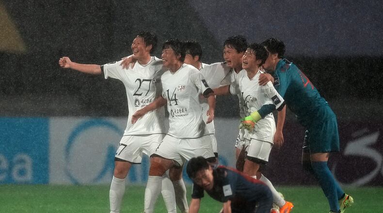 North Korea's Naegohyang Women's FC players celebrate after defeating South Korea's Suwon FC in their AFC Women's Champions League semifinal match in Suwon, South Korea, Wednesday, May 20, 2026. (AP Photo/Lee Jin-man)