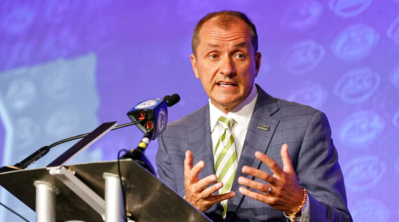 ACC commissioner Jim Phillips answers a question during a news conference at the ACC media days in Charlotte, N.C., Wednesday, July 20, 2022. (AP Photo/Nell Redmond)