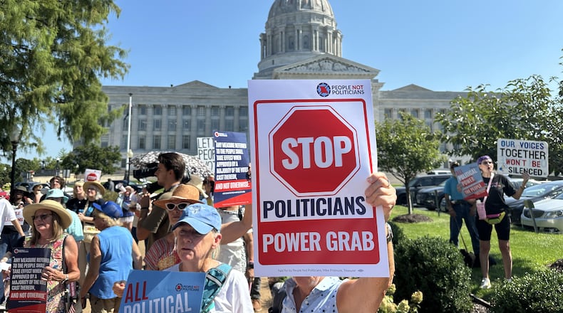 In this photo taken with a smartphone, people opposed to a congressional redistricting plan rally outside the Missouri Capitol in Jefferson City, Mo., Wednesday, Sept. 2, 2026. (AP Photo/David A. Lieb)