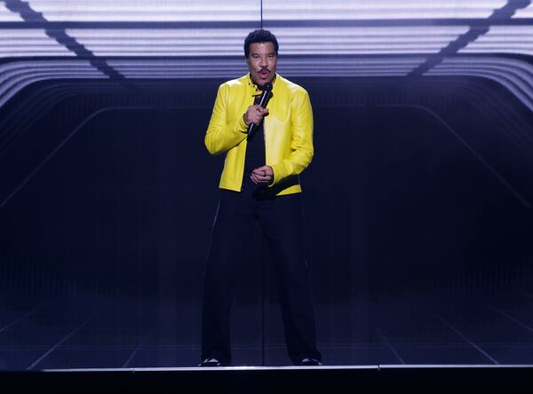 Lionel Richie, 77, took time during his performance at State Farm Arena on Sunday, July 19, 2026, to address his recent health scare. “I got this under control,” he said. (Akili-Casundria Ramsess for the AJC)