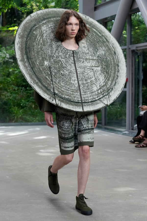 A model wears a creation part of the Issey Miyake men's Spring-Summer 2026 collection, that was presented in Paris Thursday, June 26, 2025. (AP Photo/Michel Euler)