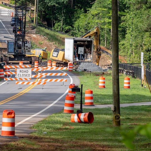 Work is underway to replace the Freemanville Road bridge on Thursday, May 28, 2026, in Milton. The state transportation agency says its inspectors determined a new bridge was needed to replace the structure, originally erected in 1960. (Ben Hendren for the AJC)