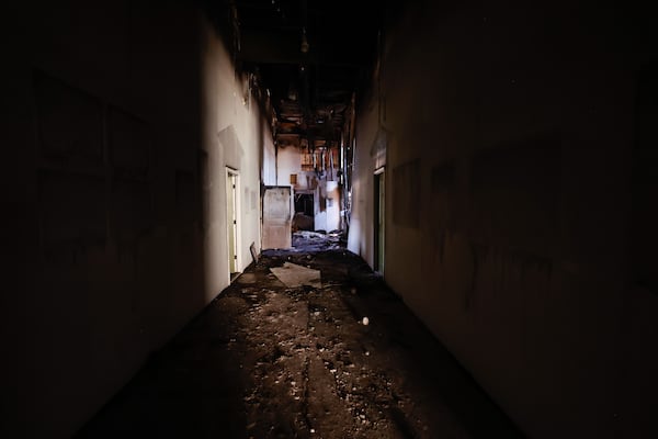 A Wednesday blaze at South River Art Studios ravaged one of three warehouses on the property where about 35 artists create and store all their supplies. The studio is off Constitution Road at the end of Fleetwood Drive in DeKalb County. (Natrice Miller/ AJC)