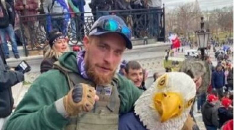 Glen Mitchell Simon of Jefferson is the latest Georgian to be charged in the Jan. 6 attack on the U.S. Capitol.  Authorities say he posted this picture of himself on Facebook from outside the Capitol.