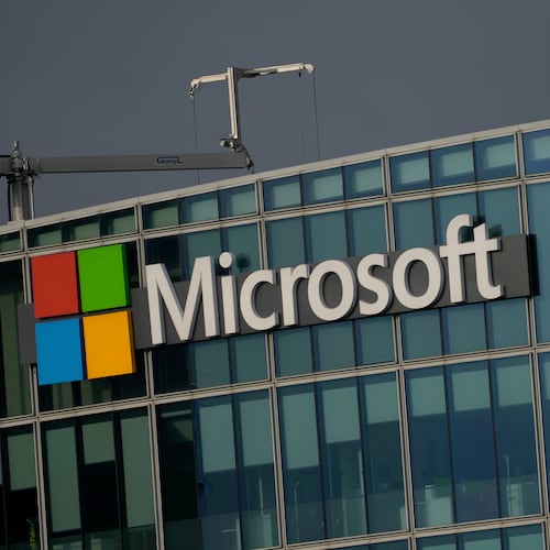 FILE - The logo of Microsoft is seen outside its French headquarters in Issy-les-Moulineaux, outside Paris on May 13, 2024. (AP Photo/Thibault Camus, File)