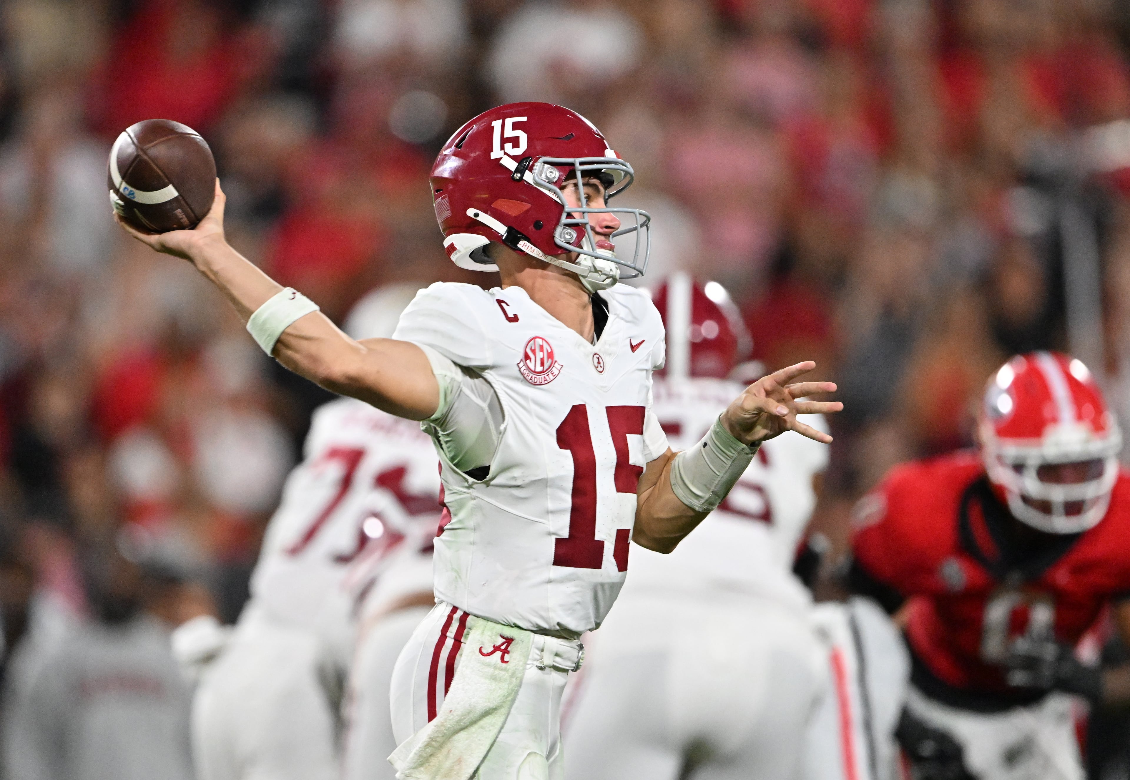 Alabama quarterback Ty Simpson (15) gets off a pass during the second half in an NCAA football game at Sanford Stadium, Saturday, September 27, 2025, in Athens. Alabama won 24-21 over Georgia. (Hyosub Shin / AJC)