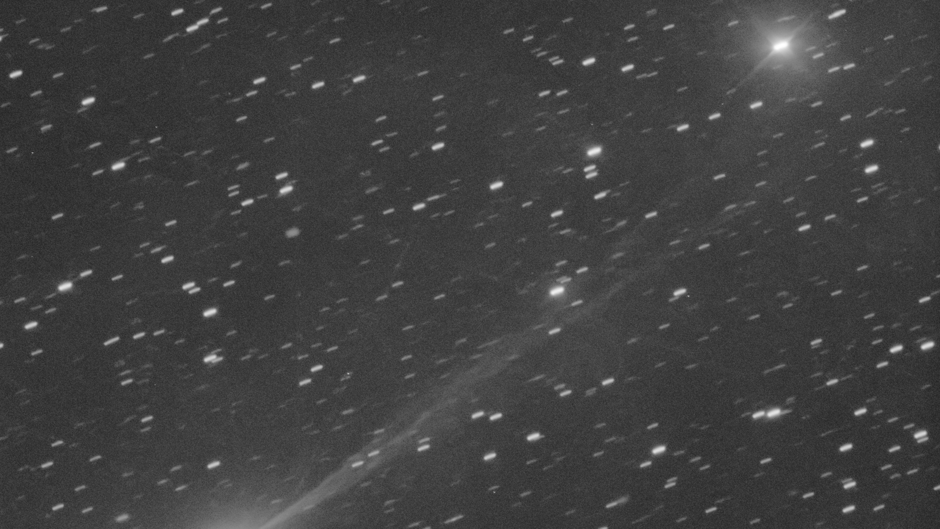 This photo provided by Gianluca Masi shows the interstellar comet 3I/Atlas as it streaks through space, 190 million miles from Earth, on Wednesday, Nov. 19, 2025. The image was taken from Manciano, Italy. (Gianluca Masi via AP)