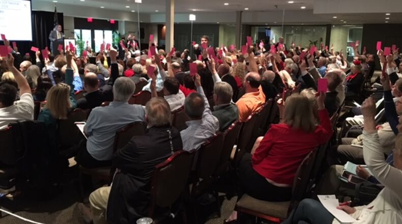 Republican gathering for the sixth congressional district in Alpharetta. Activists were voting with red cards on delegates supporting Texas Sen. Ted Cruz and Donald Trump. AJC/Special