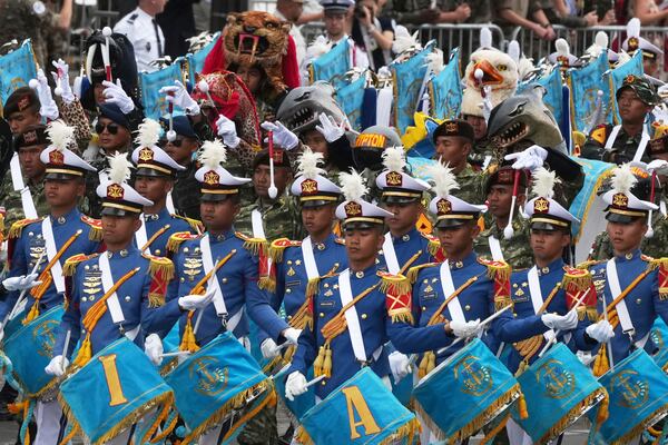 Indonisian army band members march march during the Bastille Day parade, Monday, July 14, 2025 in Paris. (AP Photo/Michel Euler)