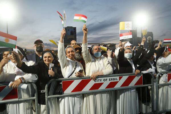FILE.- Iraqi Christians say goodbye to Pope Francis after an open air Mass at a stadium in Irbil, Iraq, Sunday, March 7, 2021. (AP Photo/Hadi Mizban,File)
