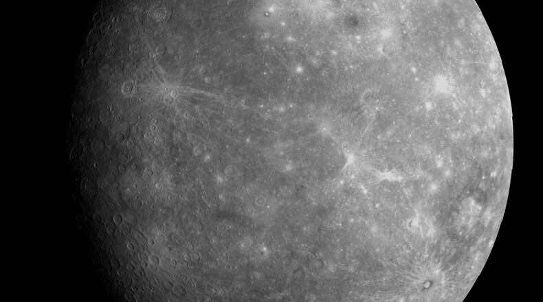This composite image provided by NASA/Johns Hopkins University Applied Physics Laboratory/Carnegie Institution of Washington on Oct. 22, 2013, shows Mercury as it appeared to the Messenger spacecraft following a flyby of the planet. (NASA/Johns Hopkins University Applied Physics Laboratory/Carnegie Institution of Washington via AP)