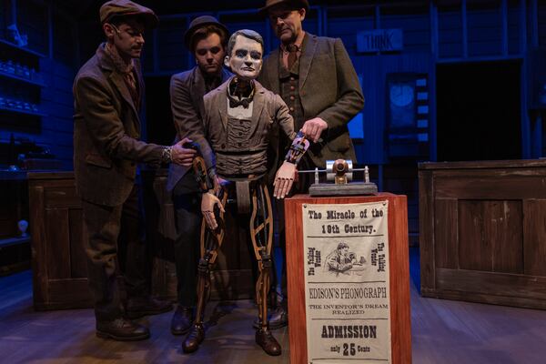 Edison, puppeteered by Krakovsky, from left, Burnette and Hines in 2023, displays his phonograph invention. (Photo courtesy of Center for Puppetry Arts/Stacey Bode)