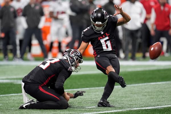 Atlanta Falcons place-kicker Younghoe Koo (6) kicks the ball during the first half of an NFL football game against Tampa Bay Buccaneers, Sunday, Sept. 7, 2025, in Atlanta. (AP Photo/Mike Stewart)