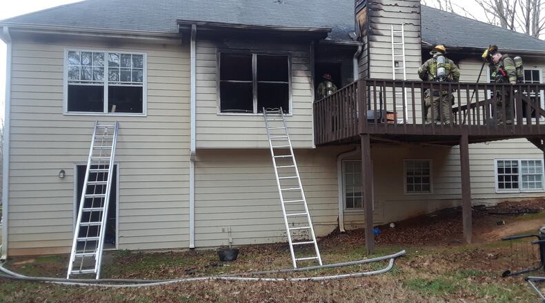 An adult died after being extricated from a fire at their Loganville home, Gwinnett County Emergency Services said.