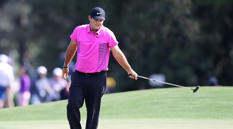 Patrick Reed reacts to his missed birdie putt, giving him par, on eight during the final round of the Masters Tournament Sunday, April 8, 2018, at Augusta National Golf Club.