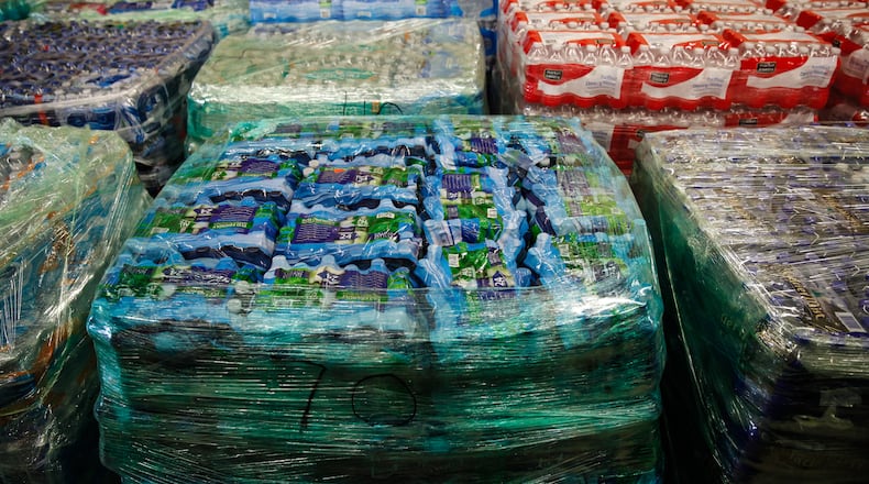 FLINT, MI - FEBRUARY 7: Cases of bottled water are shown at a fire station in Flint, Michigan. Months ago the city told citizens they could use tap water if they boiled it first, but now say it must be filtered to remove lead. (Photo by Sarah Rice/Getty Images)